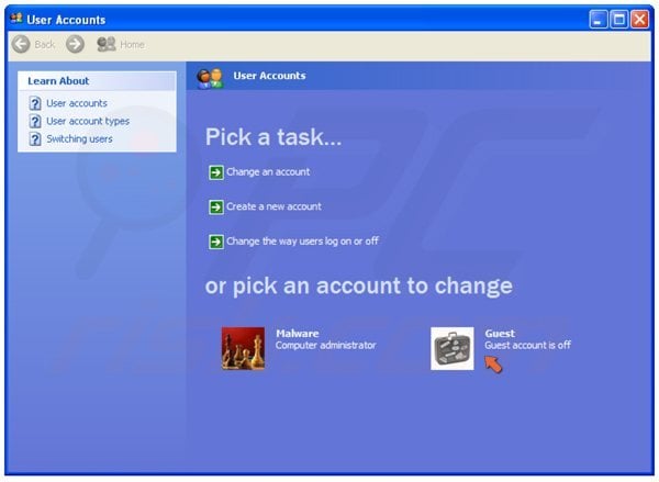Turning on a guest user on Windows XP step 3 - clicking 