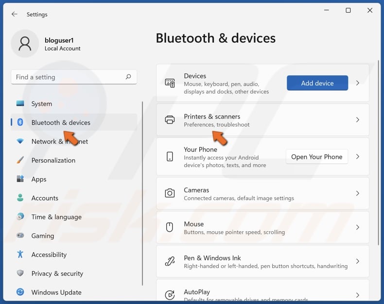 Select Bluetooth & devices and select Printers & scanners