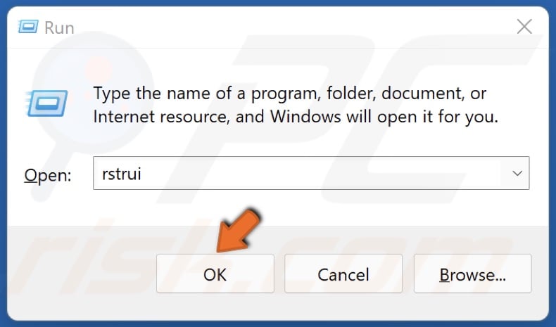 Type in rstrui in Run and click OK
