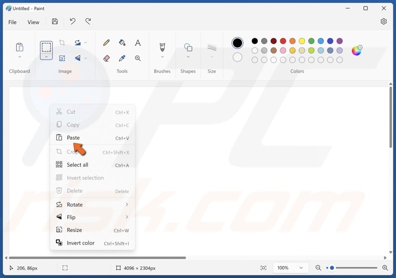 right-click the drawing area and click Paste
