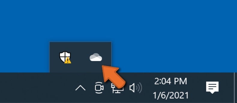 Click the OneDrive icon in the taskbar