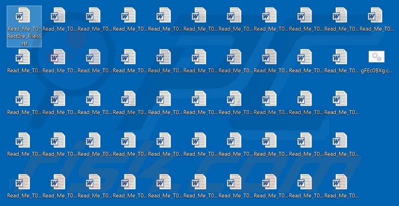 Read_Me_T0_Rest0re_Files.rtf files placed on a desktop